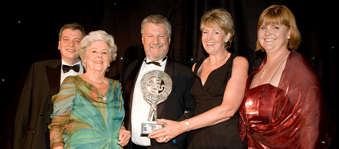 Chairman Peter Barber Accepts A Business Excellence Award In 2006